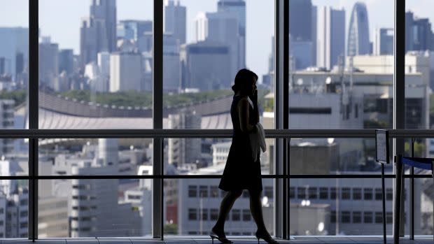 Woman on phone in business suit