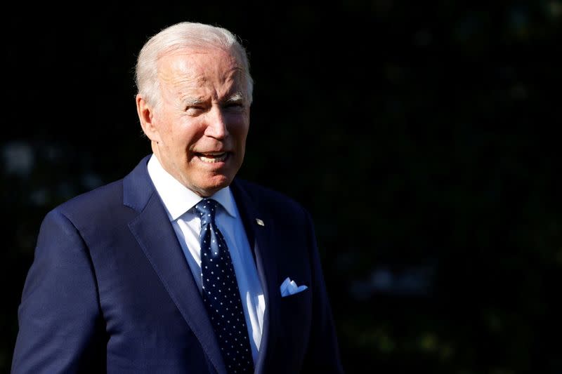 FILE PHOTO: U.S. President Biden speaks briefly with reporters at the White House in Washington