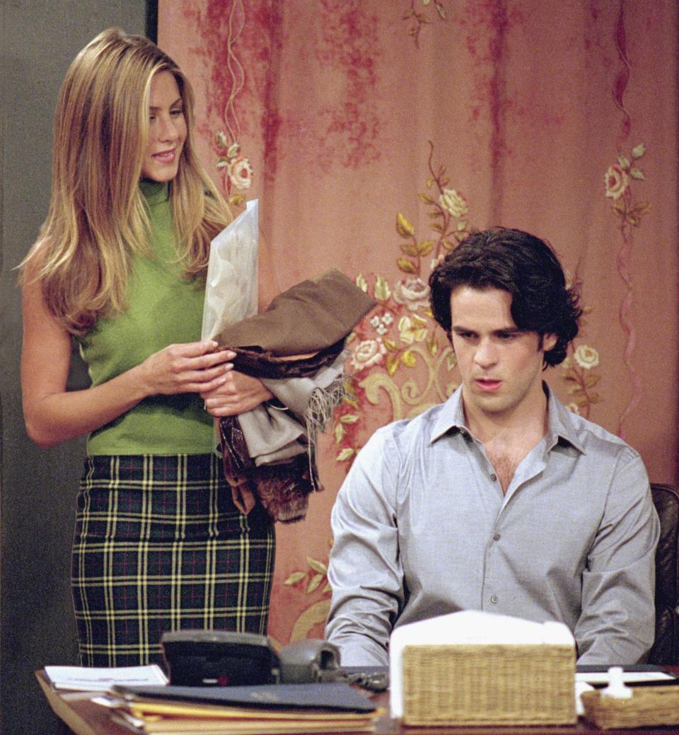 Rachel Green with her assistant, Tag Jones, at Ralph Lauren. (Photo: NBC via Getty Images)