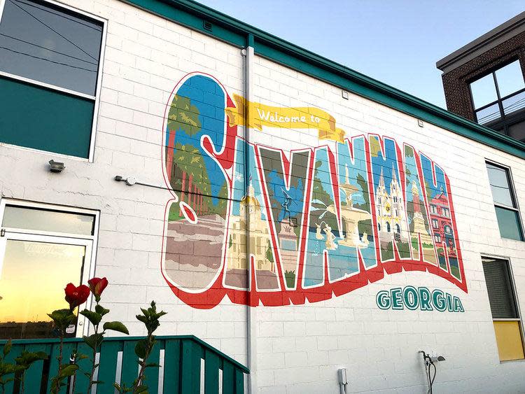 FILE - A retro mural sits on the side of the Thunderbird Inn in Savannah. The city was recently named a top retirement destination by Southern Living with a particular emphasis on Savannah's art and culture.