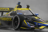 Colton Herta celebrates after winning an IndyCar auto race at Indianapolis Motor Speedway in Indianapolis, Saturday, May 14, 2022. (AP Photo/Michael Conroy)