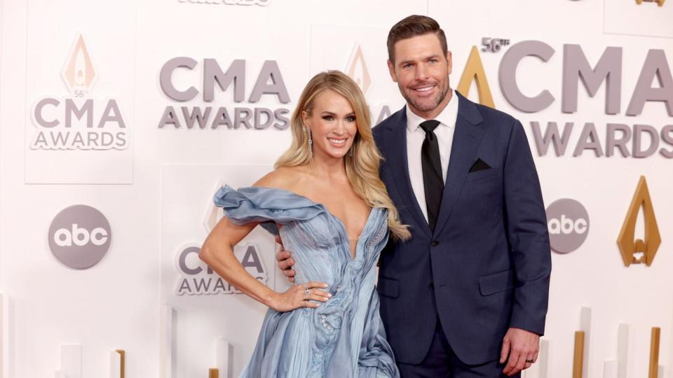 PHOTO: Carrie Underwood and Mike Fisher attend The 56th Annual CMA Awards at Bridgestone Arena, Nov. 9, 2022, in Nashville, Tenn. (Sara Kauss/FilmMagic/Getty Images)