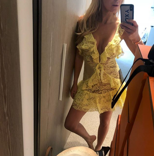 <p>Mirror selfie done right, she wears a gorgeous yellow lace dress from Glam Corner. Source: Instagram/roxyjacenko </p>