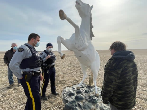 An 11 foot tall, stainless steel unicorn statue that was stolen from its home in the village of Delia, about 170 kilometres northeast of Calgary, has been found in a farmers field. (Submitted by Jaydee Bixby - image credit)