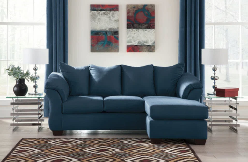 long navy blue L-shaped sectional couch