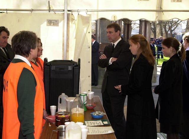 The Duke of York meeting the Women's Royal Voluntary Service, who served refreshments to the public queuing to view the Queen Mother's coffin