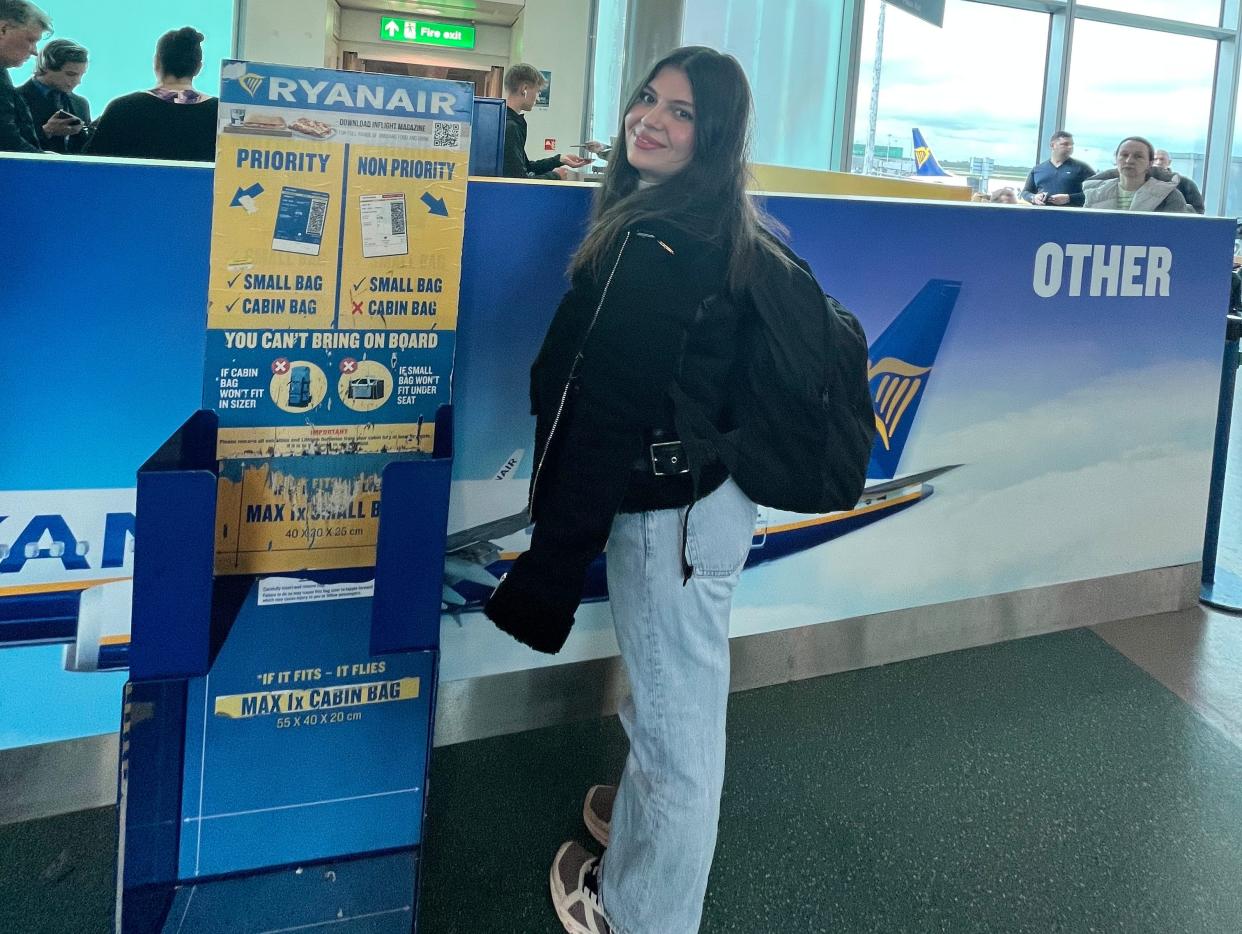 A woman at a Ryanair gate.