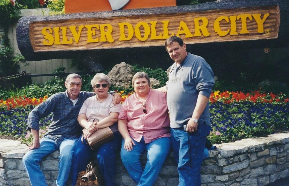 Bill and Carolyn Suman, left, are joined by friends Carolyn and Alan Tyson during a 2013 visit to the Silver Dollar City theme park in Branson, Mo.