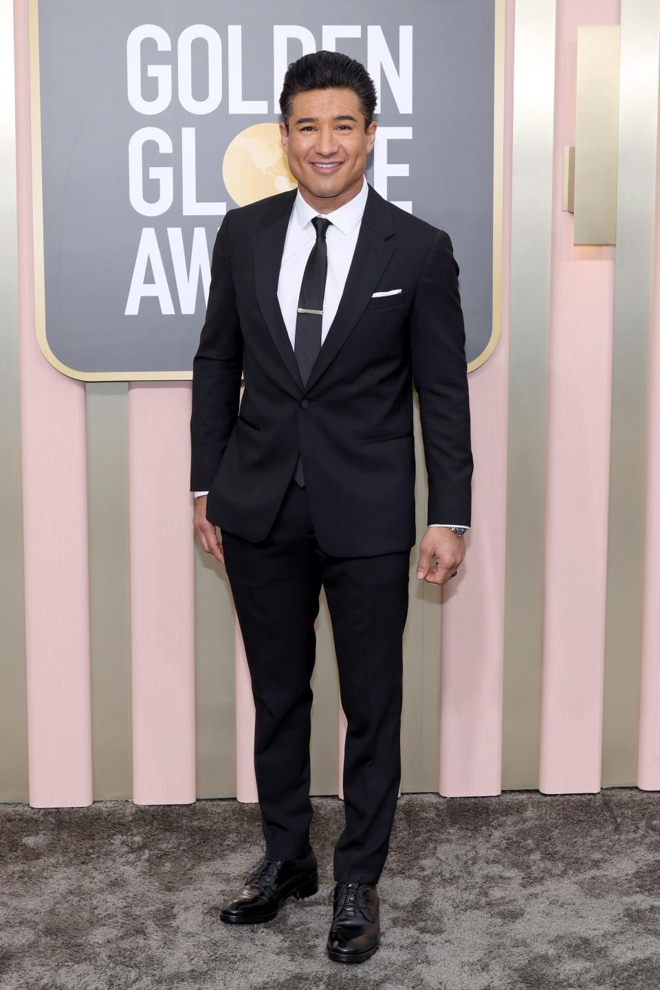 mario lopez wearing a black suit at the 2023 golden globes