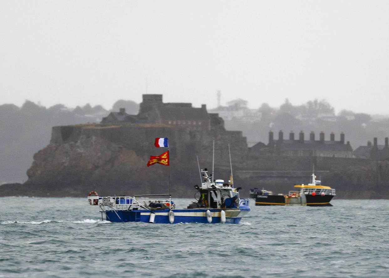 <p>French fishing boats protest in front of the port of Saint Helier </p> (AFP via Getty Images)