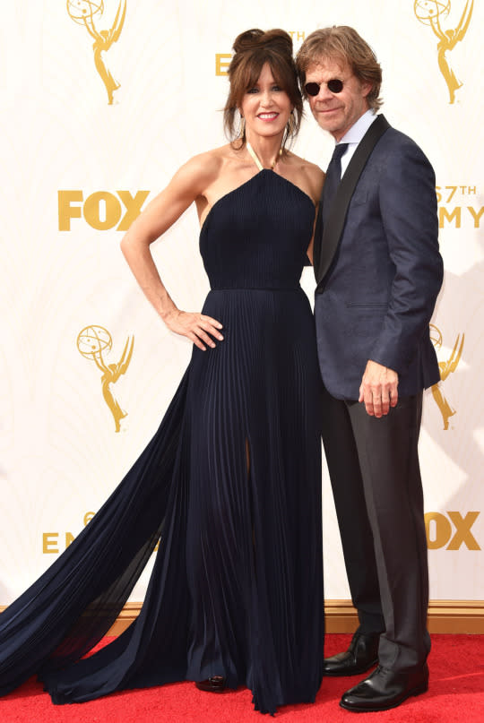 <p>Felicity Huffman, who recently dyed her blonde hair to a much darker brunette shade, wore a navy blue pleated dress with a halter top. The dress, while great, would’ve been fantastic had it not been for her distracting beehive hairstyle. </p>