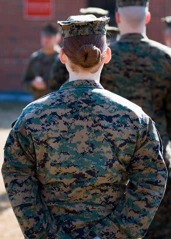 <p>Getty</p> A stock image of a woman Marine.