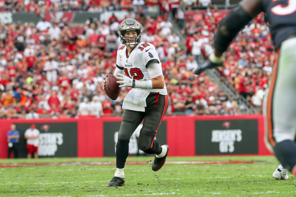 TAMPA, FL - OCTOBER 24: Tampa Bay Buccaneers Quarterback Tom Brady (12) looks for an open receiver during the regular season game between the Chicago Bears and the Tampa Bay Buccaneers on October 24, 2021 at Raymond James Stadium in Tampa, Florida. (Photo by Cliff Welch/Icon Sportswire via Getty Images)