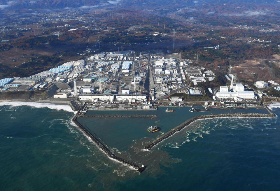 FILE - This Nov. 22, 2016, aerial file photo shows Fukushima Dai-ichi nuclear power plant in Okuma, Fukushima prefecture, Japan. The World Trade Organization has upheld South Korea's import ban on Japanese seafood from areas affected by the 2011 nuclear disaster in Fukushima. South Korea on Friday, April 12, 2019, welcomed the decision and said it will continue to block all fishery products from Fukushima and seven neighboring prefectures to ensure "only foods that are confirmed as safe are put on the table."(Kyodo News via AP, File)