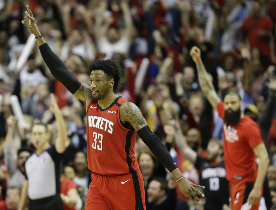 Houston Rockets forward Robert Covington (33) reacts after making a three point basket late in the second half of an NBA basketball game against the Utah Jazz, Sunday, Feb. 9, 2020, in Houston. (AP Photo/Eric Christian Smith)