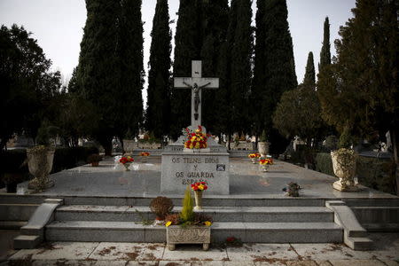 A monument that reads "God keeps you and Spain guards you" stands at Guadalajara's cemetery, Spain, January 19, 2016.REUTERS/Juan Medina
