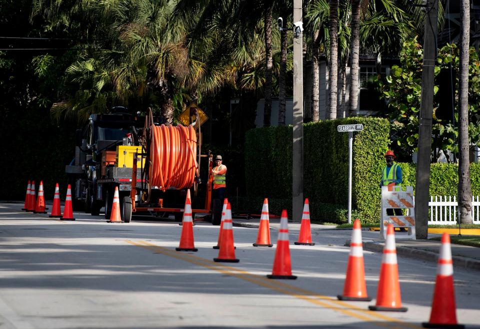 Cocoanut Row is closed to one lane of traffic as Wilco Electrical LLC employees continue undergrounding work in November.