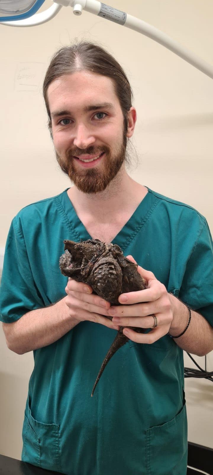 PHOTO: Dr. Dominic Moule, a veterinary surgeon at Wild Side Vets in Cumbria, England, is pictured holding the snapping alligator turtle on Monday, Feb. 12. (Courtesy Dr. Dominic Moule)