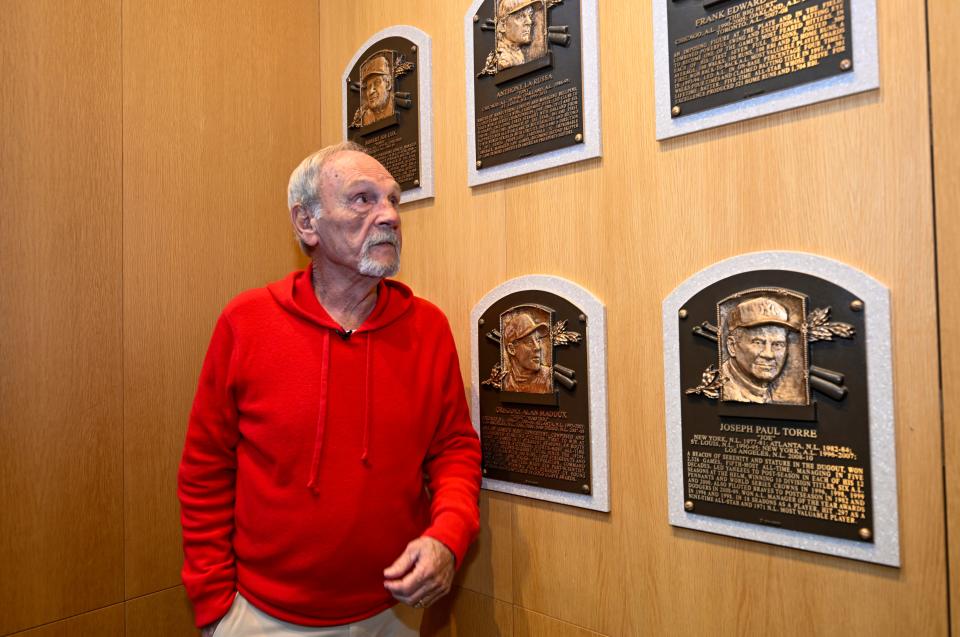 Newly elected Baseball Hall of Fame inductee Jim Leyland tours the plaque room after a news conference Tuesday, Jan. 30, 2024, in Cooperstown, New York.