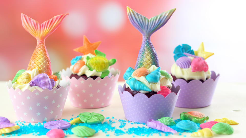 Mermaid theme cupcakes with colorful glitter tails, shells and sea creatures toppers for children's, teen's, novelty birthday and mermaid party celebrations