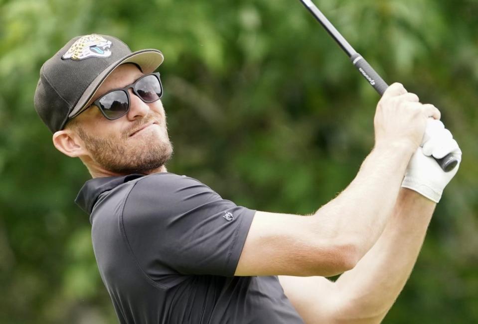 Taylor Funk of Ponte Vedra Beach follows through on a shot during his round of 60 on Sunday in a PGA Tour Canada event in Brainerd, Minn.