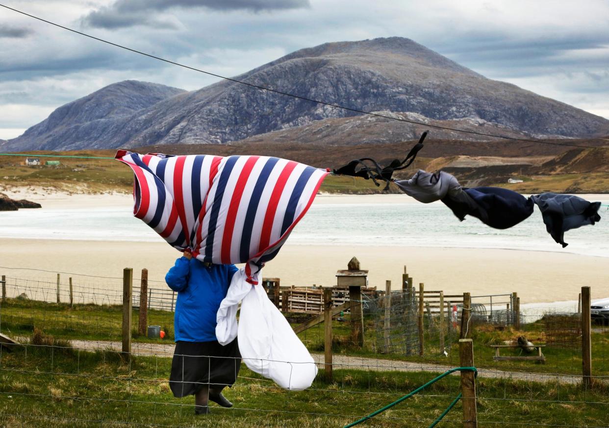 <span>Washing blows in the wind on the Isle of Lewis.</span><span>Photograph: Murdo MacLeod/The Guardian</span>