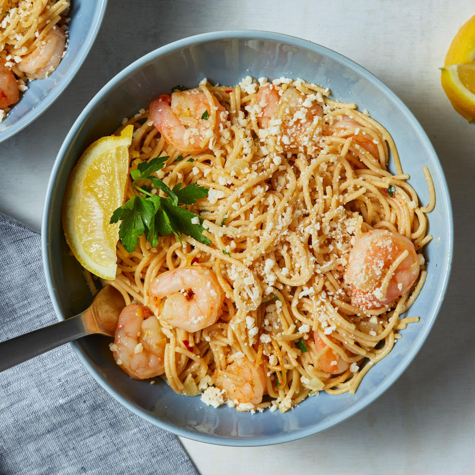 <p>Angel hair pasta is paired with shrimp and a savory sauce with garlic, white wine and lemon. This simple dish is light, quick and easy to whip up on a busy weeknight. <a href="https://www.eatingwell.com/recipe/7892148/angel-hair-pasta-with-shrimp/" rel="nofollow noopener" target="_blank" data-ylk="slk:View Recipe;elm:context_link;itc:0;sec:content-canvas" class="link ">View Recipe</a></p>