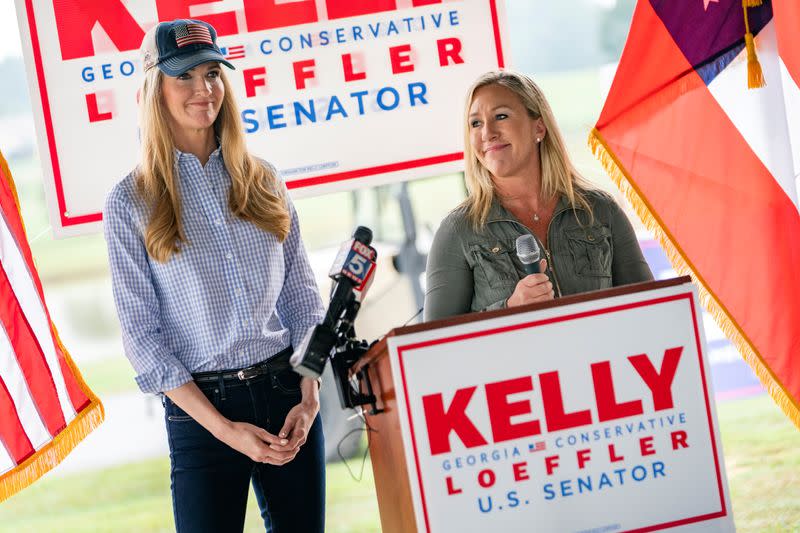 FILE PHOTO: U.S. Senator Kelly Loeffler and Marjorie Taylor Greene speak at a news conference in Dallas