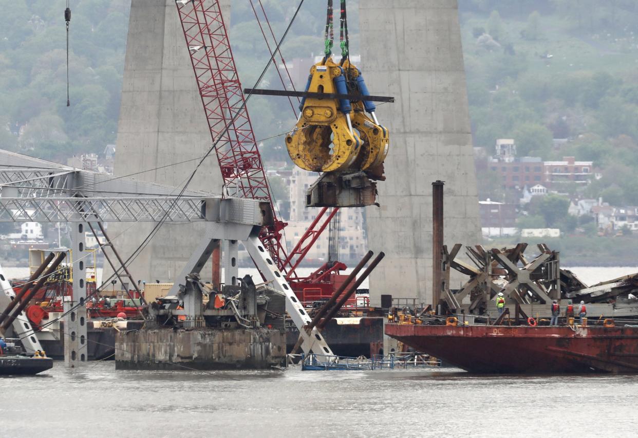 The Left Coast Lifter moves pieces of the eastern section of the Tappan Zee Bridge onto a barge May 13, 2019. The eastern section was imploded into the Hudson River in January 2019.