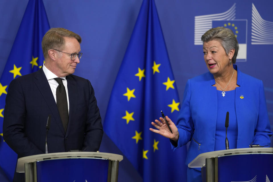 European Commissioner for Home Affairs Ylva Johansson, right, and new Executive Director of the European Border and Coast Guard, FRONTEX, Hans Leijtens, left, address a media conference at EU headquarters in Brussels, Thursday, Jan. 19, 2023. (AP Photo/Virginia Mayo)