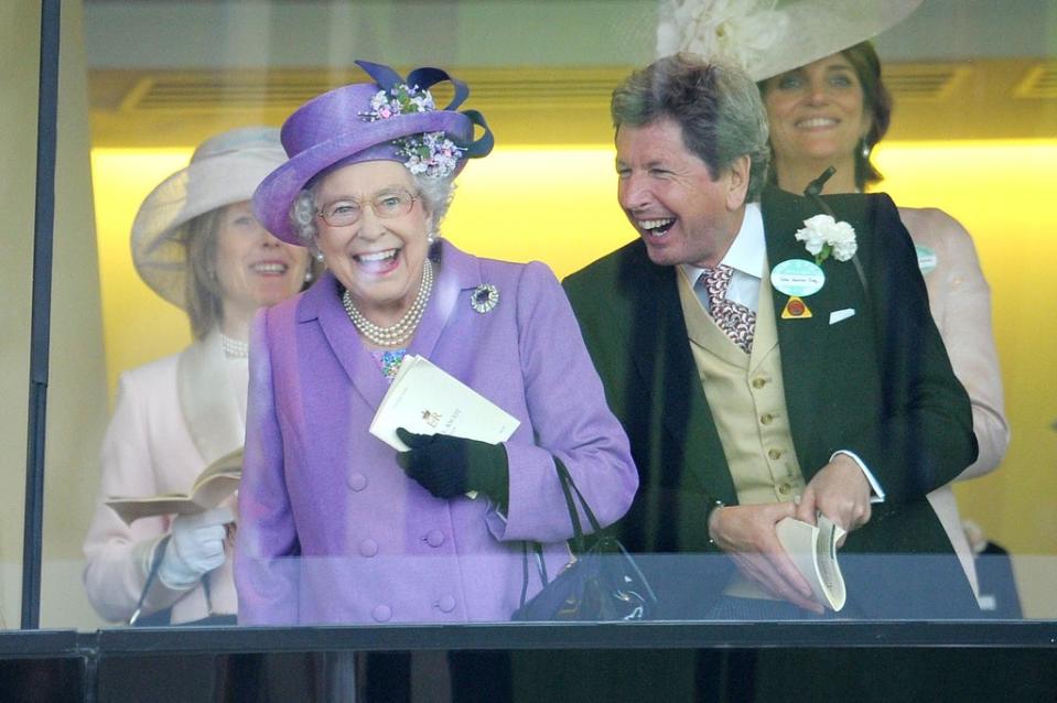 The Queen with her racing manager John Warren after her horse, Estimate, won the Gold Cup in 2013 (Tim Ireland/PA) (PA Archive)