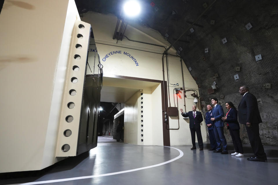 Defense Secretary Lloyd J. Austin III, Canadian Minister of National Defense Anita Anand, Canadian Prime Minister Justin Trudeau and U.S. Air Force Gen. Glen VanHerck at the Cheyenne Mountain Space Force Station facility in Colorado Springs. (Sean Kilpatrick / The Canadian Press via AP file)