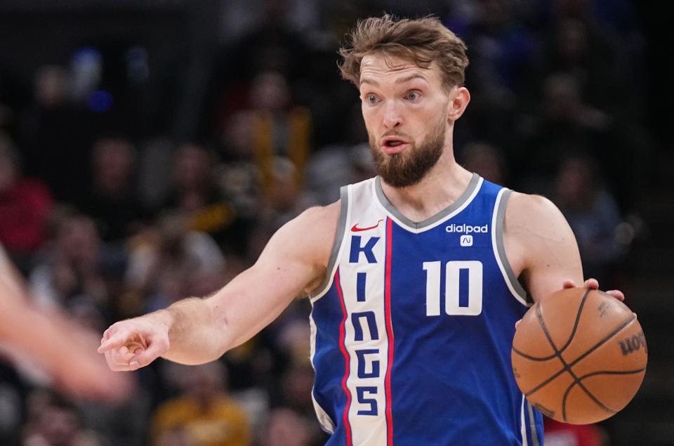 Sacramento Kings forward Domantas Sabonis (10) points up the court Friday, Feb. 2, 2024, during the game at Gainbridge Fieldhouse in Indianapolis. The Sacramento Kings defeated the Indiana Pacers, 133-122.