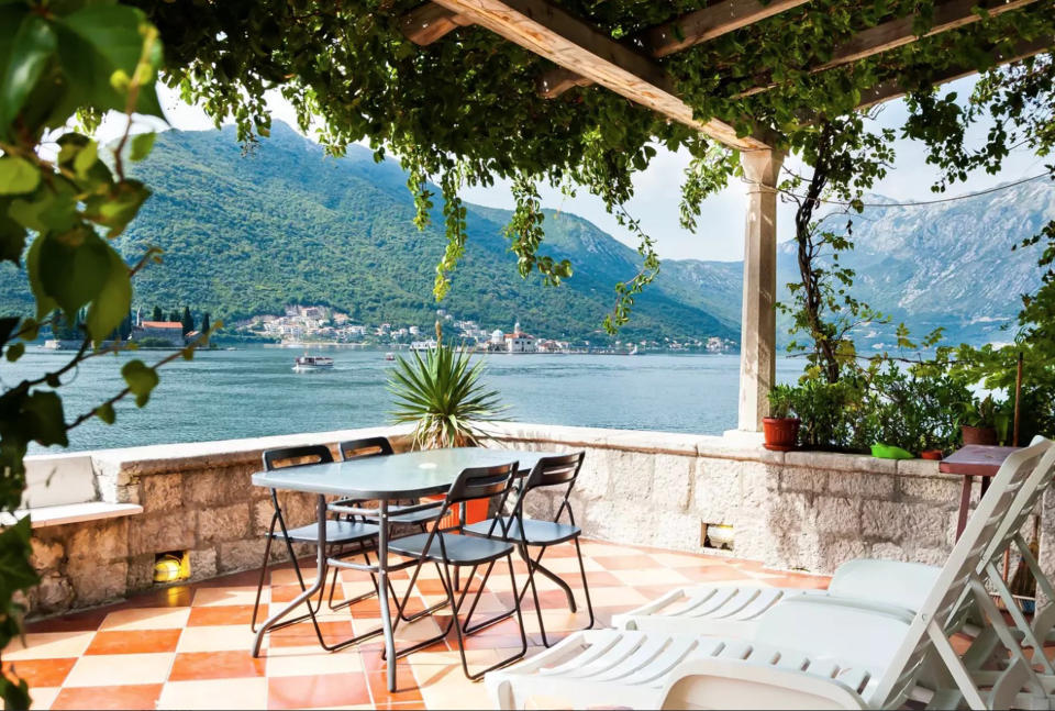 <p>Over in Montenegro lies one of Europe’s most popular Airbnbs. With Insta-worthy views of two Bay of Kotor islands, it comes as no surprise that the property has been wish listed 52,964 times. For just £36 per night, guests can enjoy its now-famous terrace with a glass of wine to hand. <strong><a rel="nofollow noopener" href="https://www.airbnb.co.uk/rooms/2791283" target="_blank" data-ylk="slk:Book now" class="link rapid-noclick-resp">Book now</a></strong>. <em>[Photo: Caters]</em> </p>
