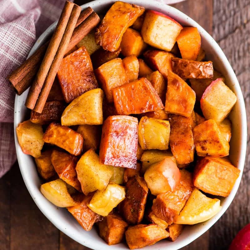 <p>Joy Food Sunshine</p><p>This cinnamon roasted sweet potatoes and apple recipe is a healthy and easy fall side dish. </p><p><strong>Get the recipe: <em><a href="https://joyfoodsunshine.com/cinnamon-roasted-sweet-potatoes-and-apples/" rel="nofollow noopener" target="_blank" data-ylk="slk:Cinnamon Roasted Sweet Potatoes and Apples;elm:context_link;itc:0;sec:content-canvas" class="link ">Cinnamon Roasted Sweet Potatoes and Apples</a></em></strong></p>