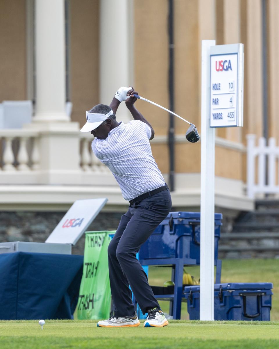 Vijay Singh prepares to drive the ball at the U.S. Senior Open at Newport Country Club on Saturday,