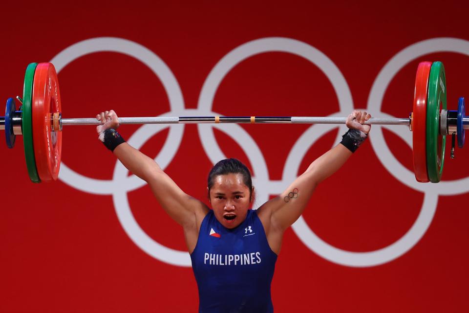Tokyo 2020 Olympics - Weightlifting - Women&#39;s 55kg - Group A - Tokyo International Forum, Tokyo, Japan - July 26, 2021. Hidilyn Diaz of the Philippines in action. REUTERS/Edgard Garrido