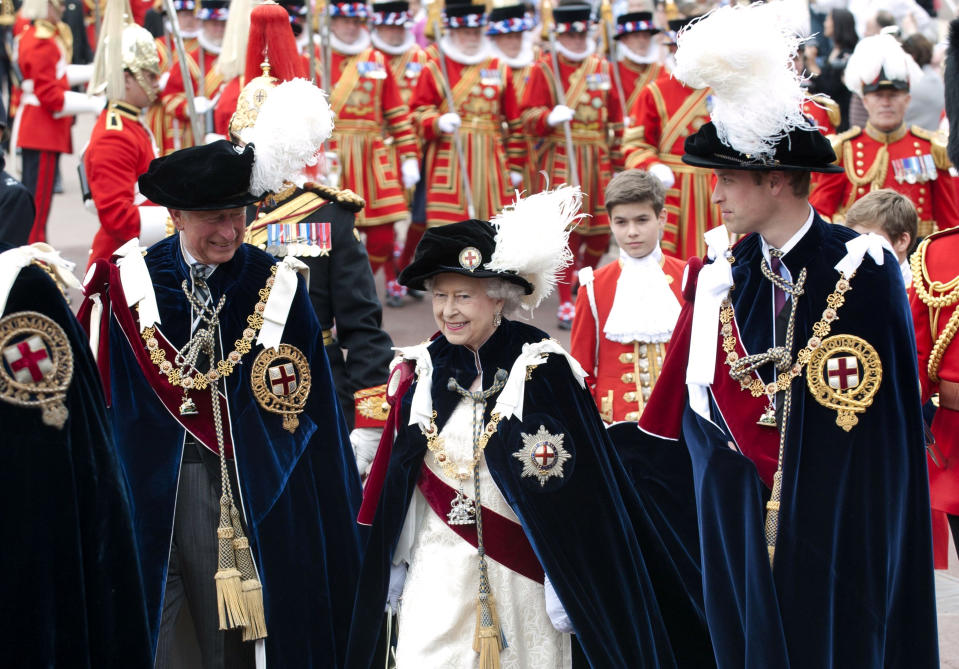 Queen Elizabeth II walks in procession with The Price of Wales and The Duke of Cambridge in the annual Garter Ceremony at Windsor Castle. The Queen was all smiles today as she took part in the historic Garter Day service on the day the Duke of Edinburgh was discharged from hospital. 