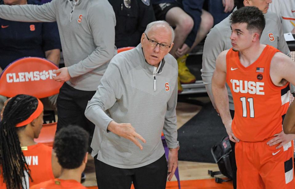 Syracuse Head Coach Jim Boeheim talks with Syracuse guard Joseph Girard III (11) during the first half with Clemson at Littlejohn Coliseum in Clemson, S.C. Wednesday, Feb. 22, 2023.