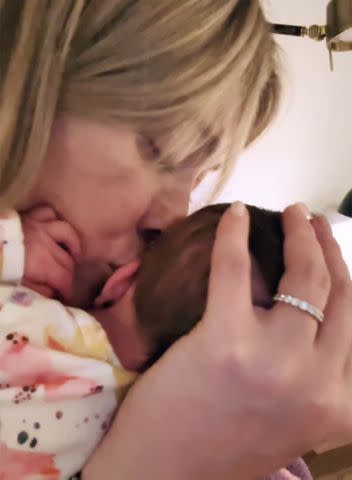 <p>Hilary Duff/Instagram</p> Hilary Duff kisses her newborn daughter Townes