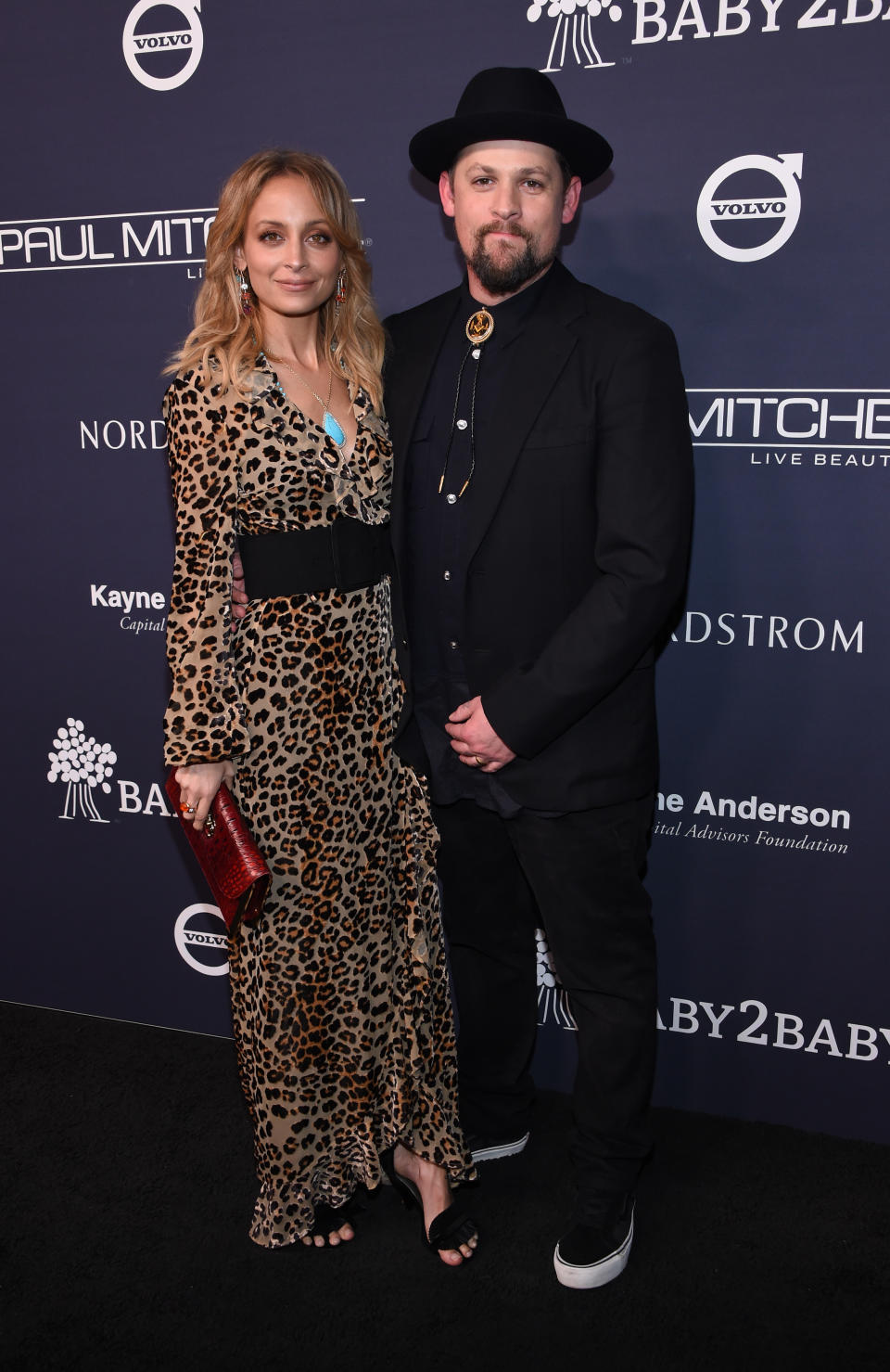 <p>Another best dressed duo, Nicole Richie and her Good Charlotte husband Joel looked fantastic this week.<em> [Photo: Getty]</em> </p>