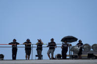 People watch a NASCAR Xfinity Series auto race at Charlotte Motor Speedway, Saturday, May 29, 2021, in Charlotte, N.C. (AP Photo/Ben Gray)