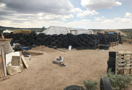 A view of the compound in rural New Mexico where 11 children were taken in protective custody after a raid by authorities near Amalia, New Mexico, August 10, 2018. Photo taken August 10, 2018. REUTERS/Andrew Hay