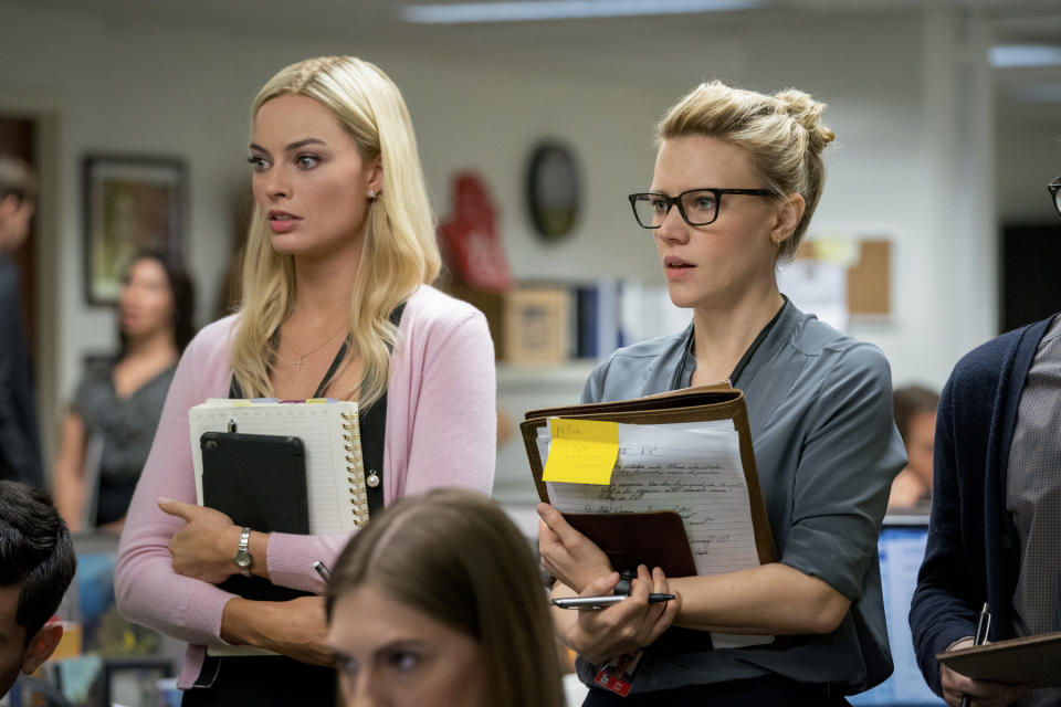 This image released by Lionsgate shows Margot Robbie, left, and Kate McKinnon in a scene from "Bombshell." On Monday, Jan. 13, Robbie was nominated for an Oscar for best supporting actress for her role in the film. (Hilary B. Gayle/Lionsgate via AP)