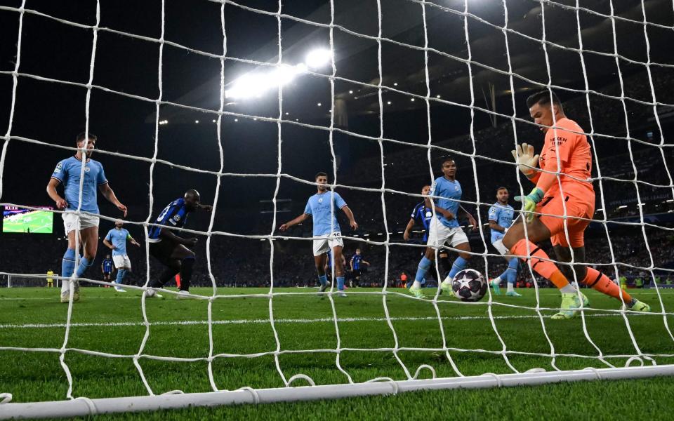 The moment Ederson stops Lukaku's header from sending the game into extra-time, there was still time for the Brazilian to make another last-gasp save - AFP/Ozan Kose