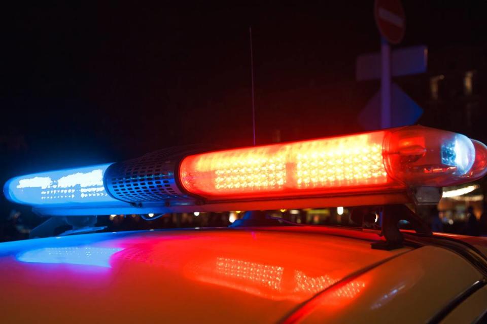 Red light flasher atop of a police car.