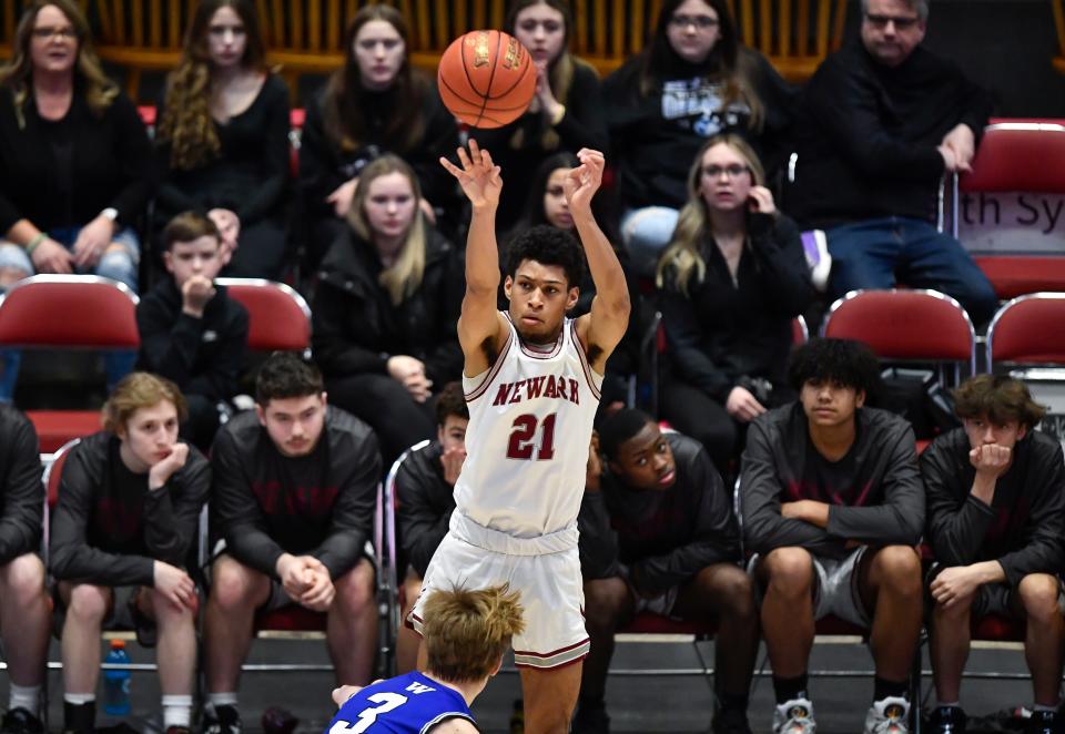 Newark's Kellen Foster takes a shot over Westhill's Luke Gilmartin during a NYSPHSAA Class B Boys Basketball Championship semifinal in Glens Falls, N.Y., Saturday, March 18, 2023. Newark’s season ended with a 63-36 loss to Westhill-III.