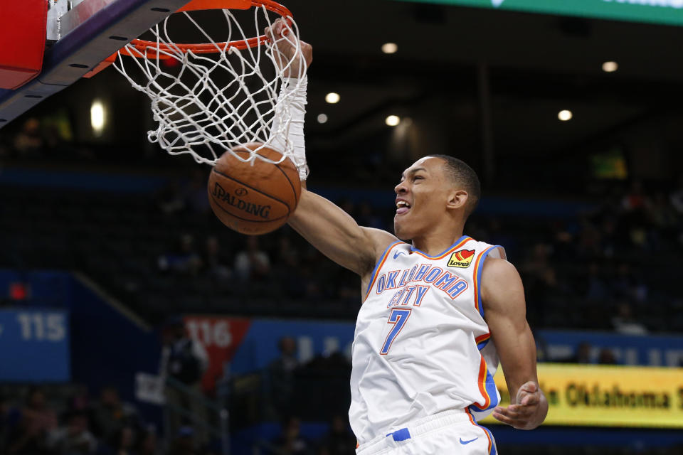 Oklahoma City Thunder forward Darius Bazley (7) dunks during the second half of the team's NBA basketball exhibition game against the New Zealand Breakers on Thursday, Oct. 10, 2019, in Oklahoma City. (AP Photo/Sue Ogrocki)