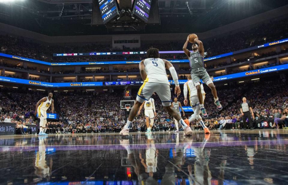 Sacramento Kings guard De’Aaron Fox (5) shoots a basket during Game 5 of the first-round NBA playoff series at Golden 1 Center on Wednesday.