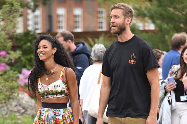 <p>Karwai Tang/WireImage</p> Calvin Harris and Vick Hope in London at the Chelsea Flower Show on May 23, 2022